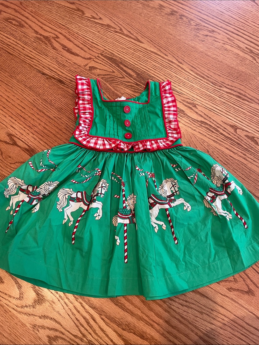 Eleanor Rose Green Carousel Horse Holiday Dress with Red Trim